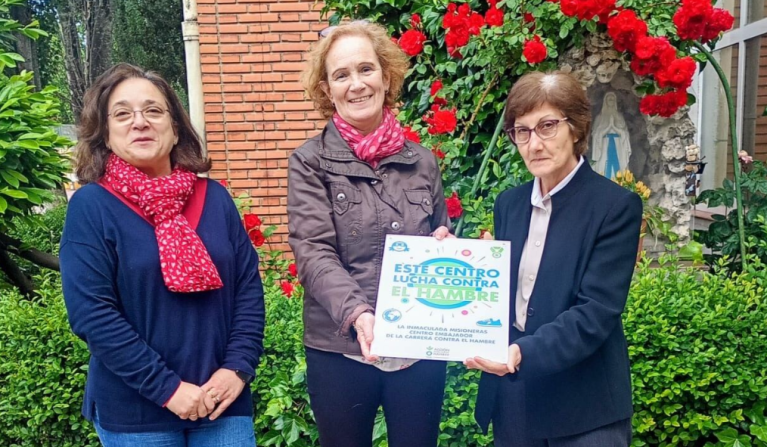 Carrera contra el Hambre entrega placa centro embajador 13